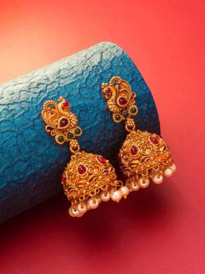 Attrective Give An Enhanced Look To Your Personality By Pairing Up This Beautiful Earring Set With Your Ethnic Attire. This Pretty Set Is In Gold Color Beautified With Stone And Pearl Work. Buy Now.