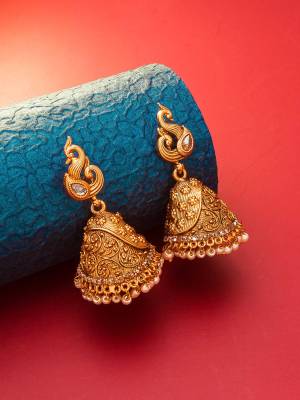 Attrective Give An Enhanced Look To Your Personality By Pairing Up This Beautiful Earring Set With Your Ethnic Attire. This Pretty Set Is In Gold Color Beautified With Stone And Pearl Work. Buy Now.