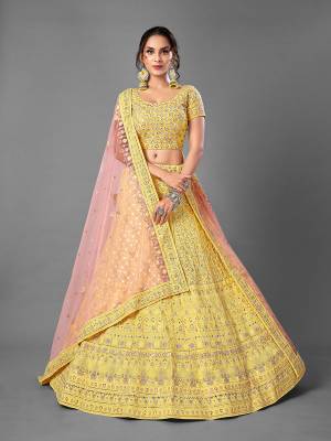 Look Attrective This Wedding Partywear Heavy Designer Lehenga Choli And Dupatta In Fine Color Fabricated On Georgette Beautified With Heavy Attractive Embroidery Work. 