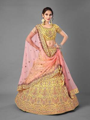 Look Attrective This Wedding Partywear Heavy Designer Lehenga Choli And Dupatta In Fine Color Fabricated On Georgette Beautified With Heavy Attractive Embroidery Work. 