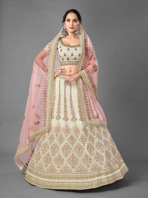 Look Attrective This Wedding Partywear Heavy Designer Lehenga Choli And Dupatta In Fine Color Fabricated On Georgette Beautified With Heavy Attractive Embroidery Work. 