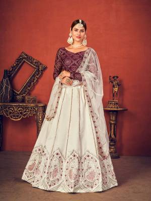 Garb This Wedding Partywear Heavy Designer Lehenga Choli And Dupatta In Fine Color Fabricated On Art Silk Beautified With Heavy Attractive Thread,Sequance Embroidery Work. 