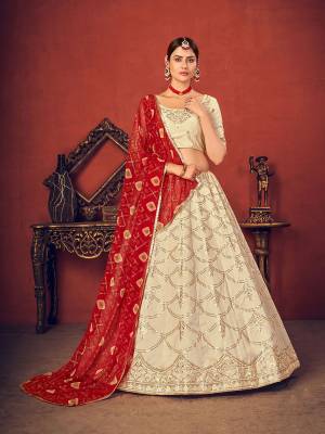 Garb This Wedding Partywear Heavy Designer Lehenga Choli And Dupatta In Fine Color Fabricated On Art Silk Beautified With Heavy Attractive Thread,Sequance Embroidery Work. 