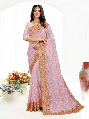 Looking This Partywear Saree Are Fine Saree Paired With Blouse.This Saree And Blouse Are Net Fabric With Heavy Designer Embroidery And Siramic Stone Work. Buy This Pretty Saree Now.