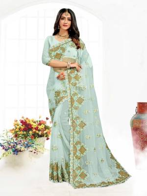 Looking This Partywear Saree Are Fine Saree Paired With Blouse.This Saree And Blouse Are Net Fabric With Heavy Designer Embroidery And Zarkan Stone Work. Buy This Pretty Saree Now.