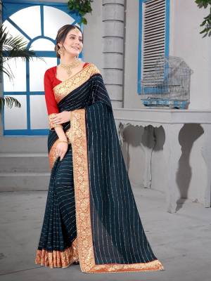 Attrective Look This Fastival Partywear Saree Are Fine Saree Paired With Blouse.This Saree Are Vichitra Silk And Blouse Are Mono Banglori Silk Based Fabric With Heavy Dew Drope With Moti And Banarasi Border. Buy This Pretty Saree Now.