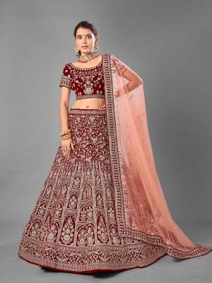 Look Attrective This Wedding Partywear Heavy Designer Lehenga Choli And Dupatta In Fine Color Fabricated On Velvet Beautified With Heavy Attractive Embroidery Work. Buy Now.