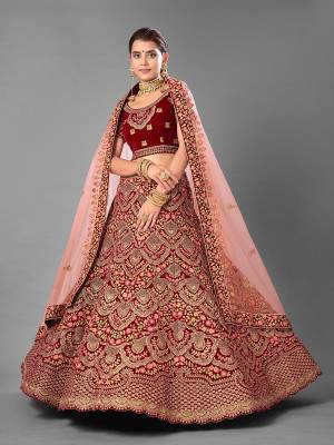 Look Attrective This Wedding Partywear Heavy Designer Lehenga Choli And Dupatta In Fine Color Fabricated On Velvet Beautified With Heavy Attractive Embroidery Work. Buy Now.