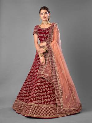 Look Attrective This Wedding Partywear Heavy Designer Lehenga Choli And Dupatta In Fine Color Fabricated On Velvet Beautified With Heavy Attractive Embroidery Work. Buy Now.