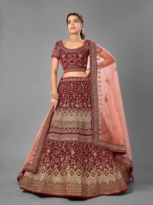 Look Attrective This Wedding Partywear Heavy Designer Lehenga Choli And Dupatta In Fine Color Fabricated On Velvet Beautified With Heavy Attractive Embroidery Work. Buy Now.