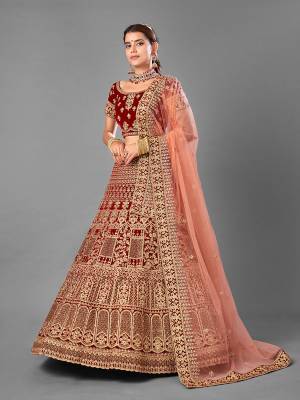 Look Attrective This Wedding Partywear Heavy Designer Lehenga Choli And Dupatta In Fine Color Fabricated On Velvet Beautified With Heavy Attractive Embroidery Work. Buy Now.