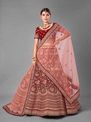 Look Attrective This Wedding Partywear Heavy Designer Lehenga Choli And Dupatta In Fine Color Fabricated On Velvet Beautified With Heavy Attractive Embroidery Work. Buy Now.