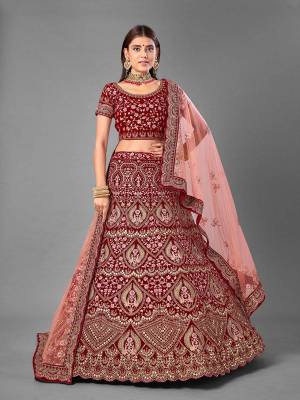 Look Attrective This Wedding Partywear Heavy Designer Lehenga Choli And Dupatta In Fine Color Fabricated On Velvet Beautified With Heavy Attractive Embroidery Work. Buy Now.