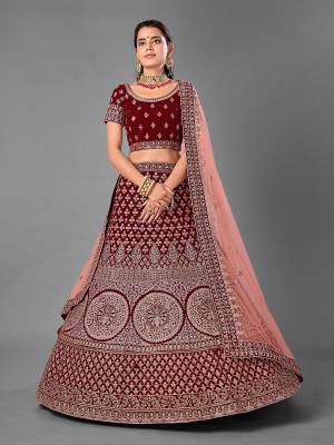 Look Attrective This Wedding Partywear Heavy Designer Lehenga Choli And Dupatta In Fine Color Fabricated On Velvet Beautified With Heavy Attractive Embroidery Work. Buy Now.