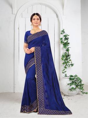 Garb This Partywear Saree Are Fine Saree Paired With Blouse.This Saree And Blouse Are Two Tone Vichitra Silk Fabric With Heavy Designer Embroidery And Border Stone Work. Buy This Pretty Saree Now.