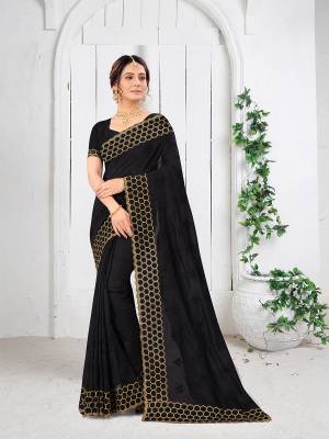 Garb This Partywear Saree Are Fine Saree Paired With Blouse.This Saree And Blouse Are Two Tone Vichitra Silk Fabric With Heavy Designer Embroidery And Border Stone Work. Buy This Pretty Saree Now.