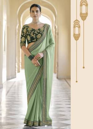 Attrective This Partywear Saree Are Fine Saree Paired With Blouse.This Saree Are Organza And Blouse Are Art Silk Based Fabric With Fancy Designer Embroidery Work. Buy This Pretty Saree Now.