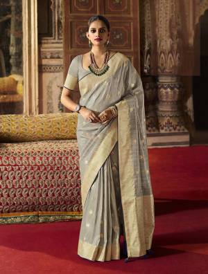 Very Rich Look This Partywear Saree Are Fine Saree Paired With Blouse.This Saree Are Silk Based And Blouse Art Silk Fabric With Heavy Wevon Designer Work. Buy This Pretty Saree Now.