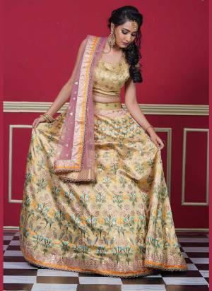 Garb This Partywear Designer Lehenga Choli And Dupatta In Fine Color Fabricated On Silk Beautified Fabric With Heavy Designer Gota Thread Embroidery With Swarovski Work. 