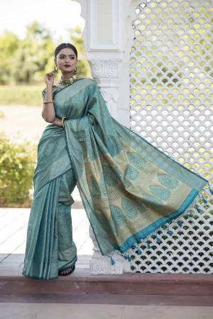 Looking This Traditional Saree Are Fine Saree Paired With Blouse.This Saree And Blouse Are Kanchipuram Silk Based Fabric With Wevon Designer Jari Work. Buy This Pretty Saree Now.