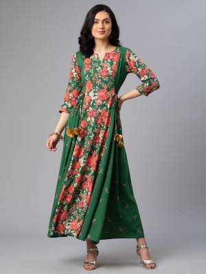 Attrective This Readymade Long Kurti In Fine Color Fabricated On Rayon Beautified With Designer Printed With Side Pocket. It Is Light In Weight And Easy To Carry All Day Long. 