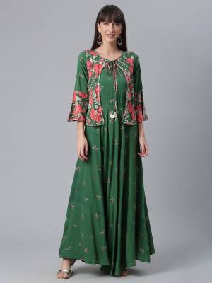 Attrective This Readymade Long Kurti In Fine Color Fabricated On Rayon Beautified With Designer Printed With Side Pocket. It Is Light In Weight And Easy To Carry All Day Long. 