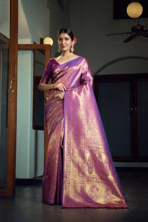 Garb This Traditional Saree Are Fine Saree Paired With Blouse.This Saree And Blouse Are Art Silk Based Fabric With Heavy Weaving Designer Work. Buy This Pretty Saree Now.