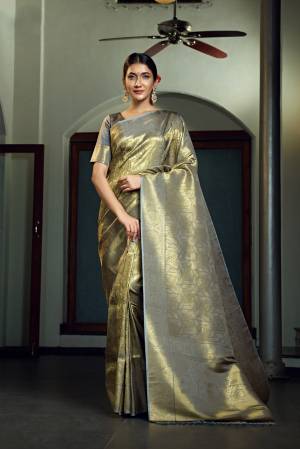 Garb This Traditional Saree Are Fine Saree Paired With Blouse.This Saree And Blouse Are Art Silk Based Fabric With Heavy Weaving Designer Work. Buy This Pretty Saree Now.