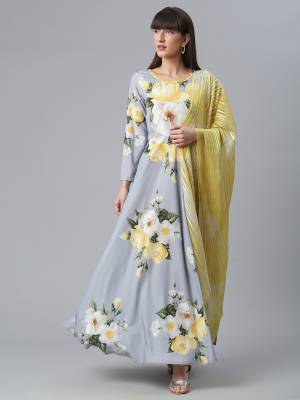 Attrective This Readymade Long Kurti With Dupatta In Fine Color Fabricated On Rayon Beautified With Designer Printed. It Is Light In Weight And Easy To Carry All Day Long. 