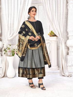 Stylist This Readymade Long Kurti With Dupatta In Fine Color Fabricated On Banarasi Silk With Dupatta Are Banarasi Silk Beautified With Wevon Designer. It Is Light In Weight And Easy To Carry All Day Long. 