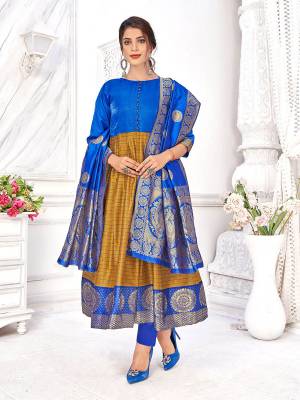 Stylist This Readymade Long Kurti With Dupatta In Fine Color Fabricated On Banarasi Silk With Dupatta Are Banarasi Silk Beautified With Wevon Designer. It Is Light In Weight And Easy To Carry All Day Long. 