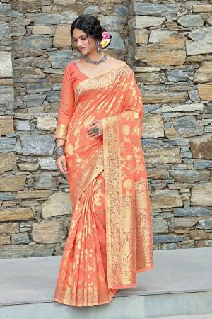 Attrective This Traditional Saree Are Fine Saree Paired With Blouse.This Saree And Blouse Are Linen Based Fabric With Heavy Wevon Designer Jari Work. Buy This Pretty Saree Now.