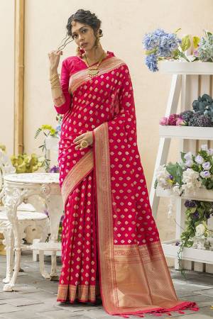 Stylist This Fastival Saree Are Fine Saree Paired With Blouse.This Saree And Blouse Are Banarasi Cotton Silk Based Fabric With Heavy Wevon Jari Designer Work.Buy This Pretty Saree Now.