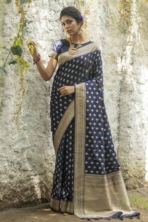 Stylist This Fastival Saree Are Fine Saree Paired With Blouse.This Saree And Blouse Are Banarasi Cotton Silk Based Fabric With Heavy Wevon Jari Designer Work.Buy This Pretty Saree Now.