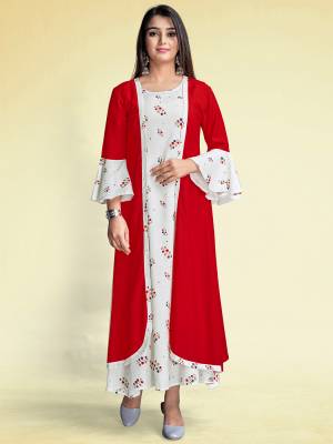 Grab This Readymade Long Dress In Fine Color Top With Jacket Are Rayon Fabricated Beautified With Designer Printed. It Is Light In Weight And Easy To Carry All Day Long. 