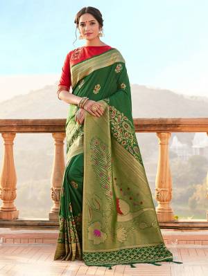 AttrectiveThis Pretty Angelic Partywear Look Wearing This Heavy Designer Weaving Work Saree In Fine Color Paired With Contrasted Blouse. This Saree And Blouse Is Banarasi Silk Fabricated.Attractive Look To Your Personality. 