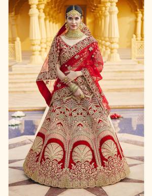 Attrective This Wedding Partywear Designer Lehenga Choli And Dupatta In Red Color Fabricated On Velvet Beautified Fabric With Heavy Designer Embroidery With Hand Work. Buy Now.