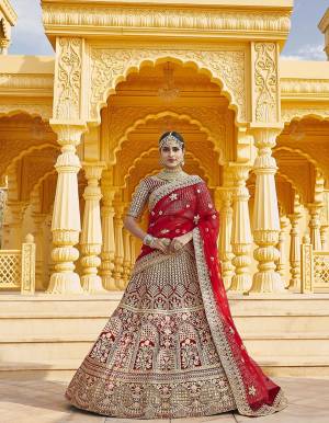 Attrective This Wedding Partywear Designer Lehenga Choli And Dupatta In Red Color Fabricated On Velvet Beautified Fabric With Heavy Designer Embroidery With Hand Work. Buy Now.