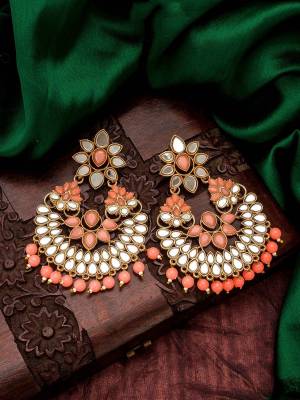 Attrective Look To Your Personality By Pairing Up This Beautiful Earring With Your Ethnic Attire. This Pretty Set Is In Fine Color Beautified With Kundan Work. Buy Now.