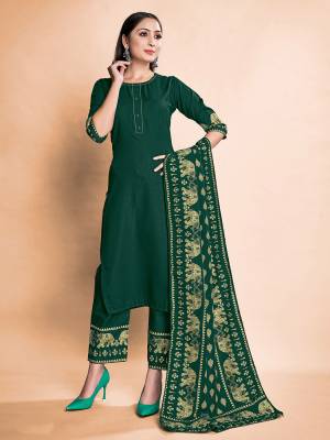 Garb This Readymade Long Dress In Fine Color Top And Bottom With Dupatta Are Rayon Fabricated Beautified With Designer Foil Printed. It Is Light In Weight And Easy To Carry All Day Long. 