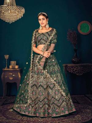 Looking This Wedding Partywear Heavy Designer Lahenga Choli In Georgette And Dupatta Net In Fabricated Beautified With Attrective Multy Thread,Sequance With Gota Patti  Embroidery And Diamond Work.Buy Now. 