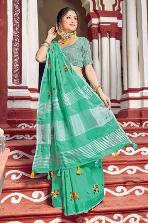 Looking This Designer Partywear Saree Are Fine Saree Paired With Blouse.This Saree And Blouse Are Linen Based Fabric With Wevon Designer With Printed. Buy This Pretty Saree Now.