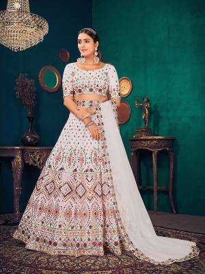 Attrective This Wedding Partywear Heavy Designer Lahenga Choli In Georgette And Dupatta Net In Fabricated Beautified With Attrective Multy Thread, Gota Patti Embroidery Work With Belt.Buy Now. 