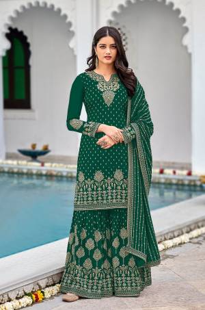 Attrective This Designer Pakistani Sharara Suit In Lovely Color.Its Pretty Heavy Designer Sequance Embroidery Work Top Is Faux Georgette Based Paired With Faux Georgette Bottom And Faux Georgette Fabricated Dupatta Which Gives An Attractive To The Suit.