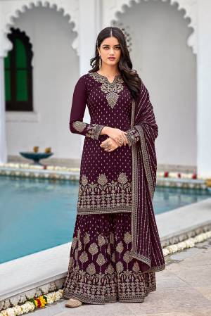 Attrective This Designer Pakistani Sharara Suit In Lovely Color.Its Pretty Heavy Designer Sequance Embroidery Work Top Is Faux Georgette Based Paired With Faux Georgette Bottom And Faux Georgette Fabricated Dupatta Which Gives An Attractive To The Suit.