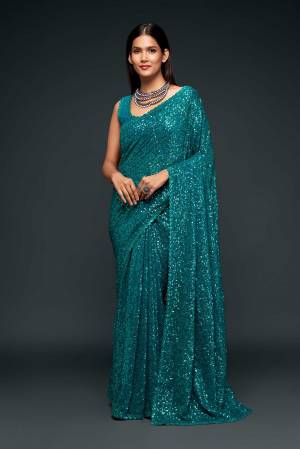 Partywear This Pretty Elegant Looking Designer Saree In Fine Color Paired With Blouse. This Saree And Blouse Are Georgette Based Beautified With Heavy Designer Sequance Embroidery Work With Blouse Work. Buy Now.