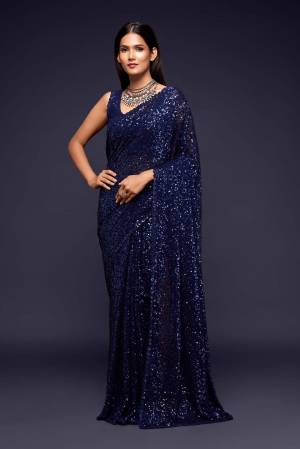 Partywear This Pretty Elegant Looking Designer Saree In Fine Color Paired With Blouse. This Saree And Blouse Are Georgette Based Beautified With Heavy Designer Sequance Embroidery Work With Blouse Work. Buy Now.