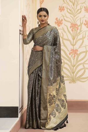 Garb This Designer Partywear Saree Are Fine Saree Paired With Blouse.This Saree And Blouse Are Kanchipuram Silk Based Fabric With Heavy Wevon Designer Work. Buy This Pretty Saree Now.