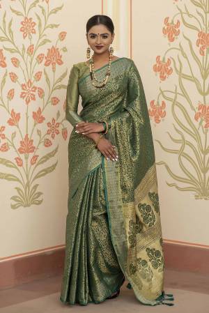 Garb This Designer Partywear Saree Are Fine Saree Paired With Blouse.This Saree And Blouse Are Kanchipuram Silk Based Fabric With Heavy Wevon Designer Work. Buy This Pretty Saree Now.