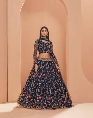 Garb This Wedding Special Designer Lehenga Choli And Dupatta In Fine Color. Blouse Are Fabricated On Net And Lahenga Are Net Beautified With Dupatta Are Net Fabric With Thread,Jari,Sequance Embroidery Work. 